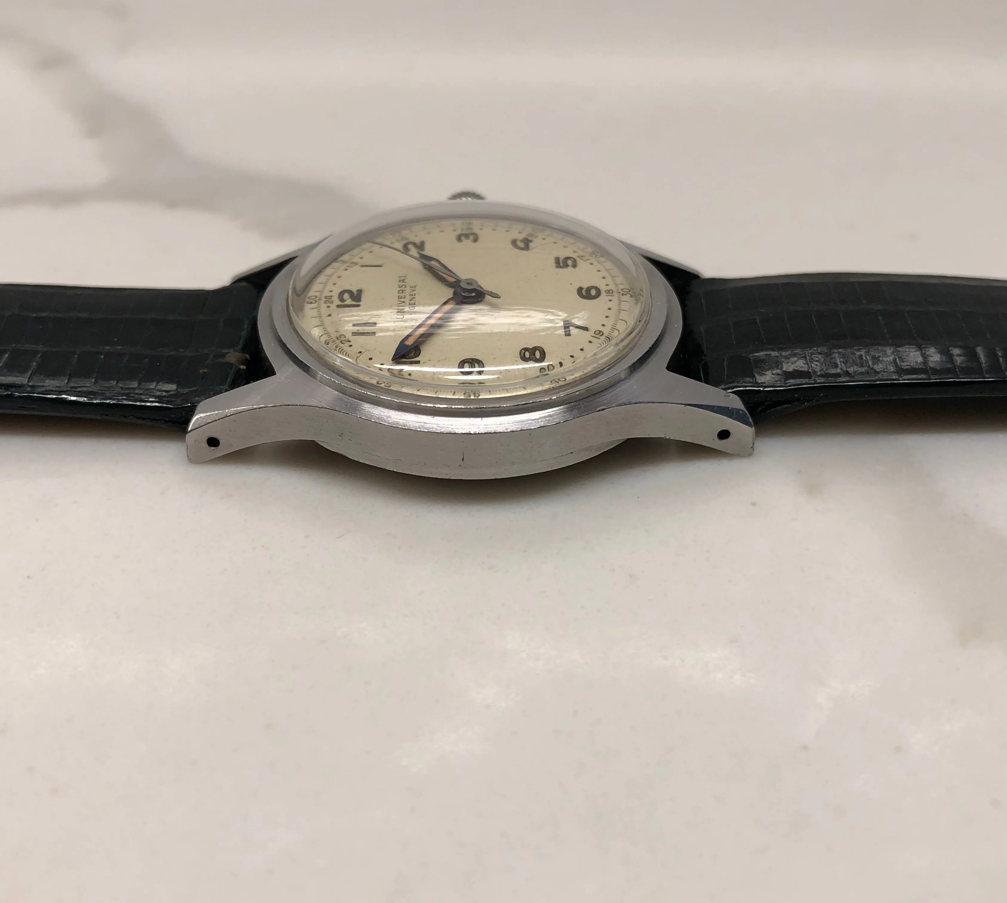 1940s Universal Geneve 20506 Radium Multiscale Dial Faceted Steel Case Caliber 267 Wristwatch