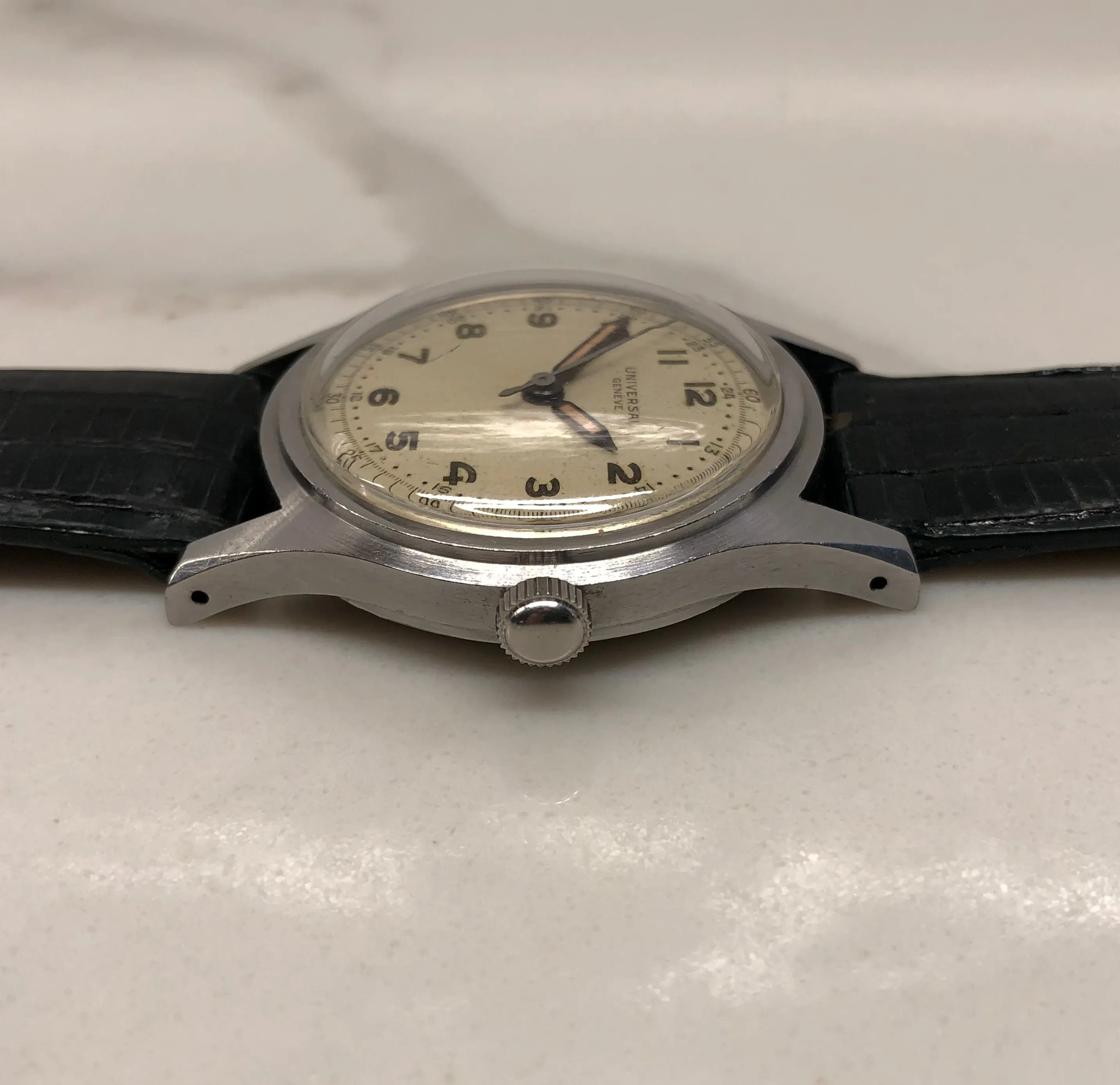1940s Universal Geneve 20506 Radium Multiscale Dial Faceted Steel Case Caliber 267 Wristwatch