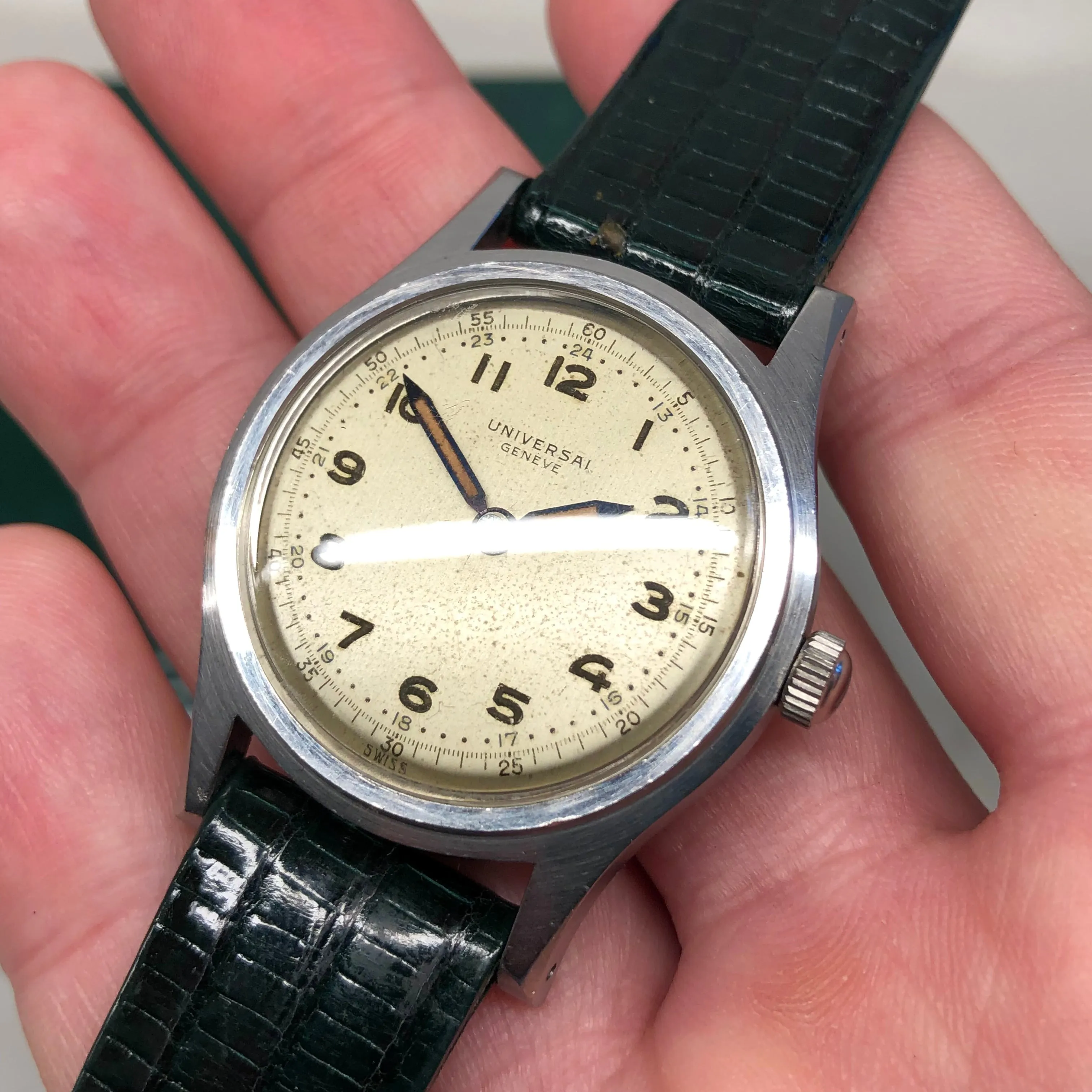1940s Universal Geneve 20506 Radium Multiscale Dial Faceted Steel Case Caliber 267 Wristwatch