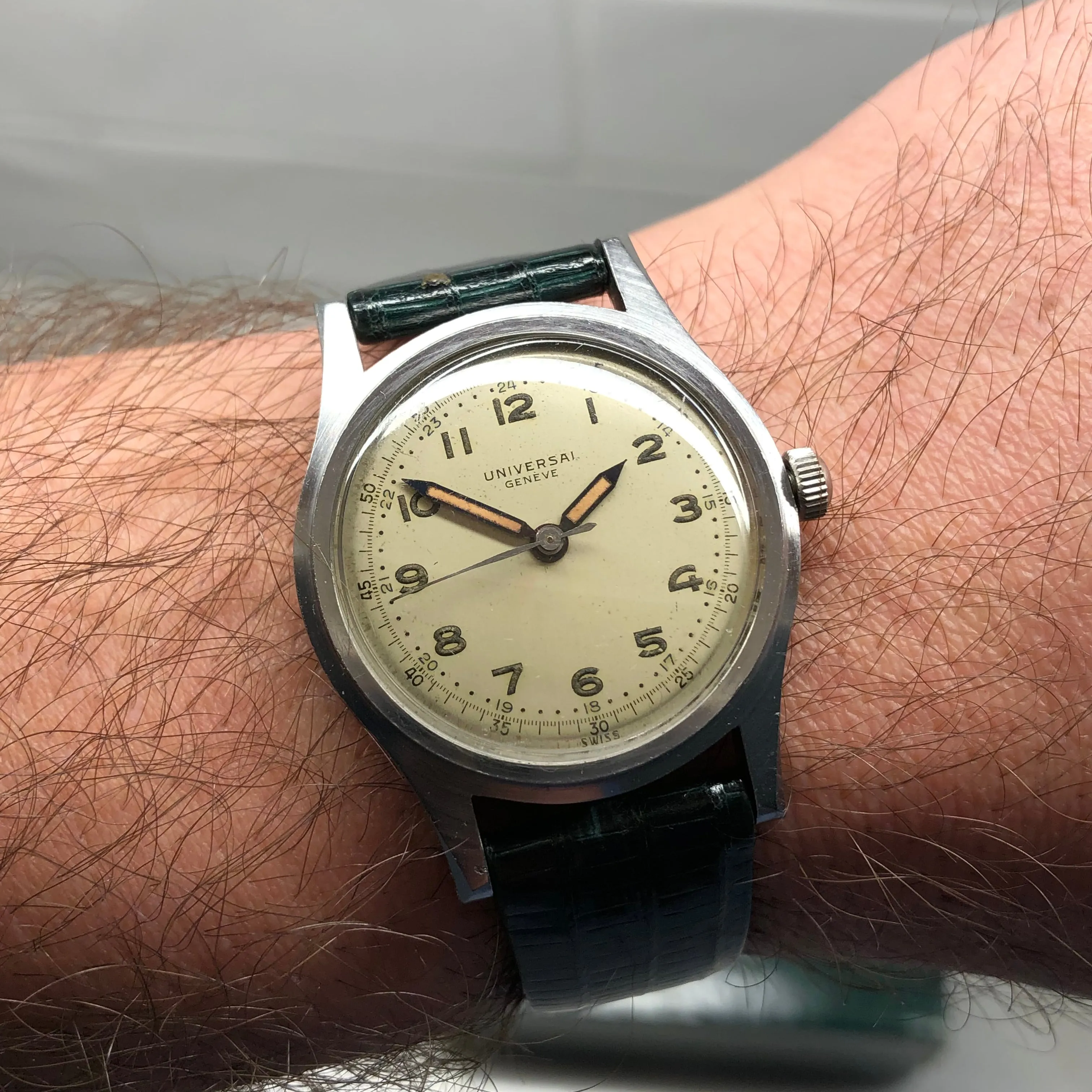 1940s Universal Geneve 20506 Radium Multiscale Dial Faceted Steel Case Caliber 267 Wristwatch