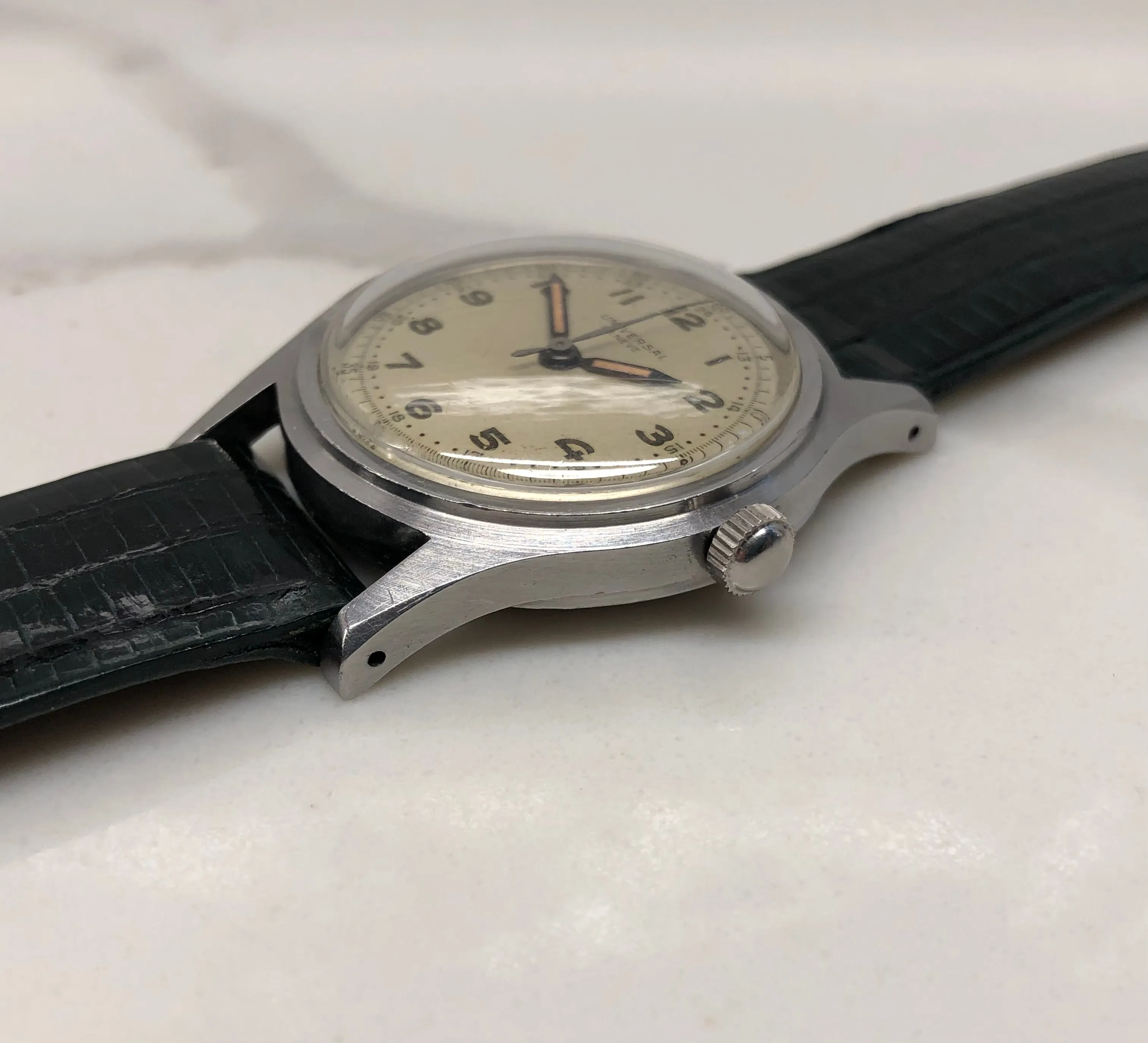 1940s Universal Geneve 20506 Radium Multiscale Dial Faceted Steel Case Caliber 267 Wristwatch