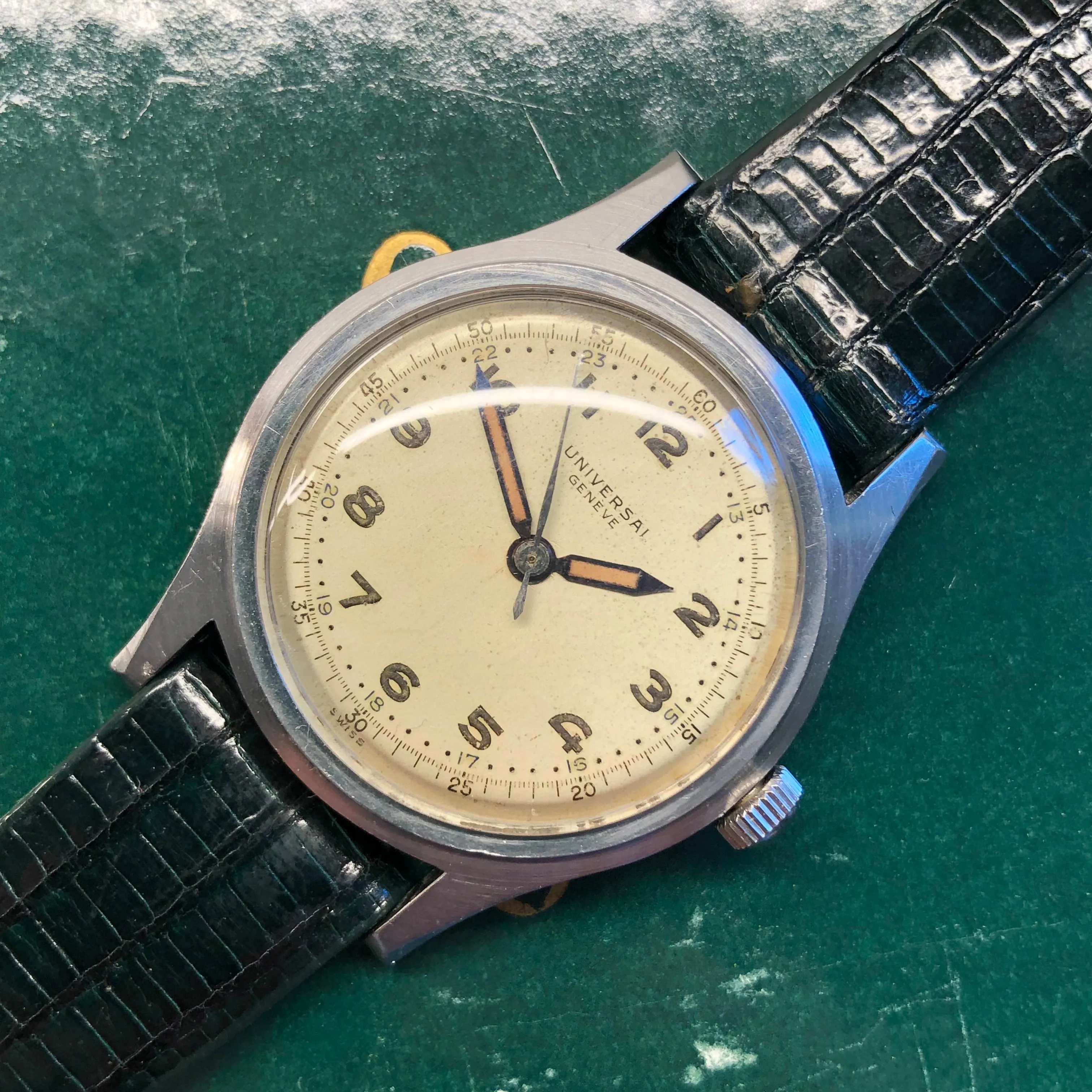 1940s Universal Geneve 20506 Radium Multiscale Dial Faceted Steel Case Caliber 267 Wristwatch