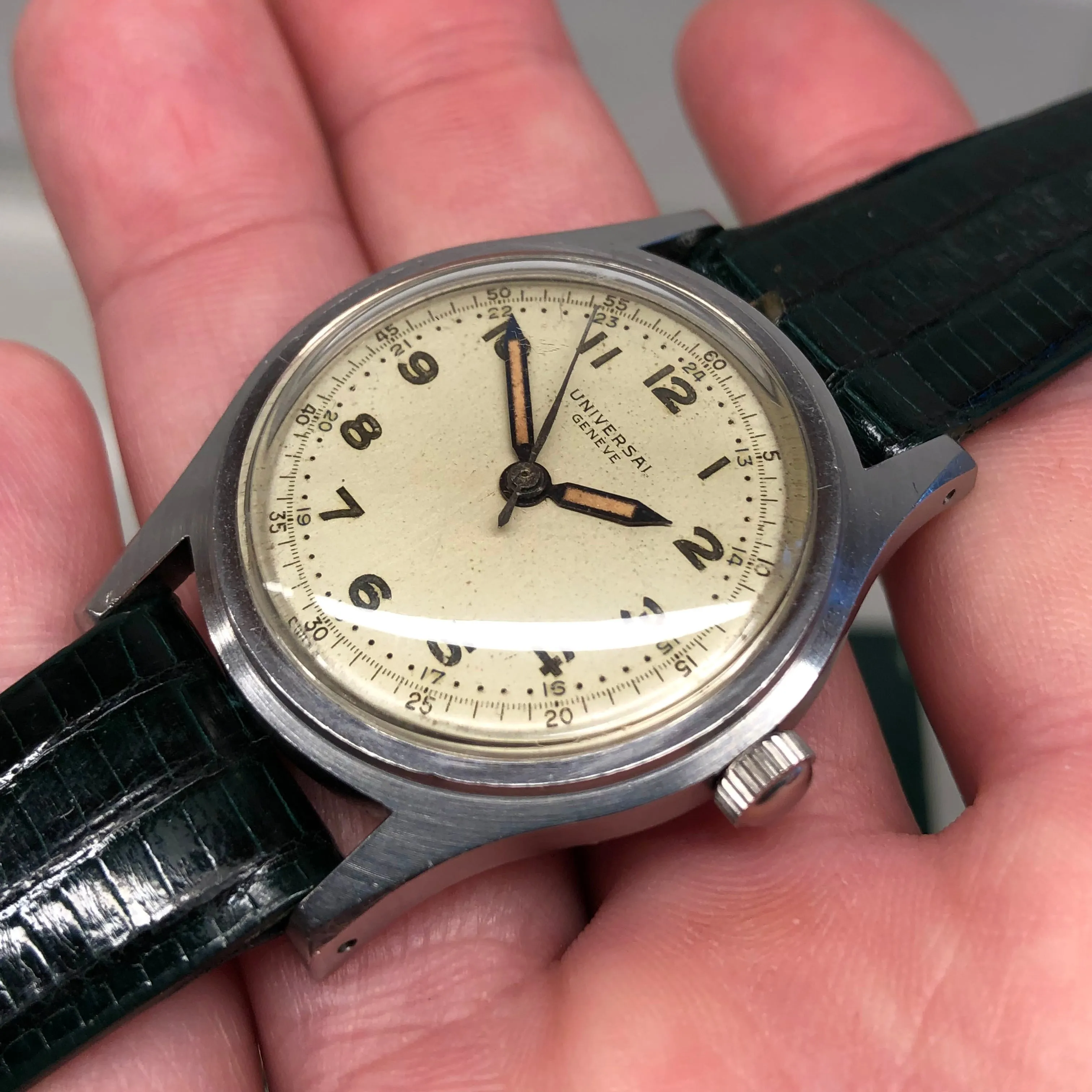 1940s Universal Geneve 20506 Radium Multiscale Dial Faceted Steel Case Caliber 267 Wristwatch