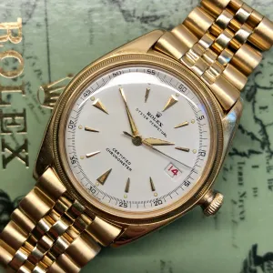 1946 Rolex Oyster Perpetual "Pre Datejust" 4467 Ovettone 18K Yellow Gold Roulette Date Wheel Automatic Wristwatch