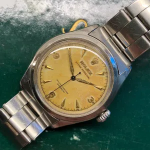 1952 Rolex Oyster Perpetual 6106 Bubbleback Steel Chronometer Tropical Wristwatch