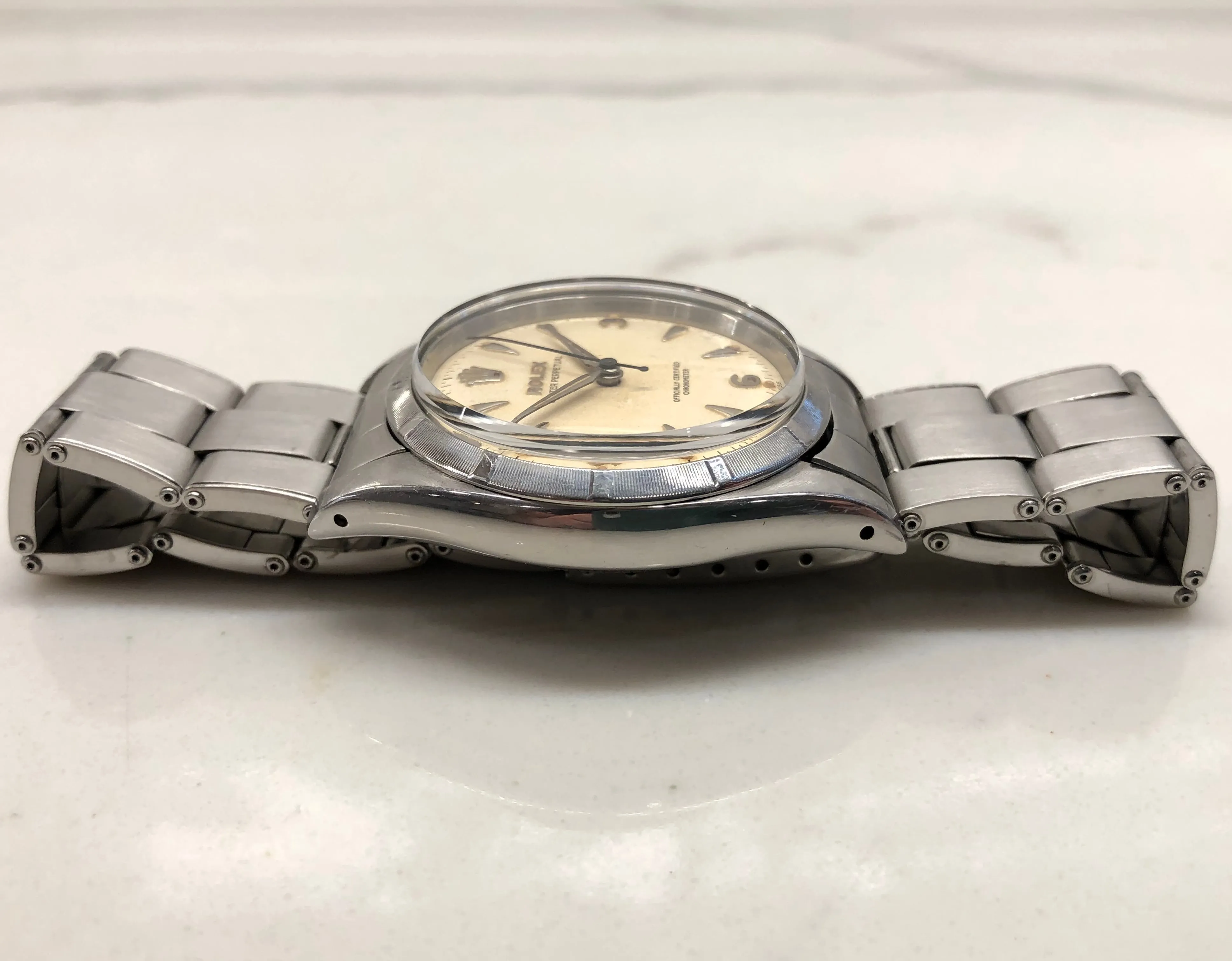 1954 Rolex Oyster Perpetual 6581 Caliber 1030 Steel Wristwatch with PX Store Box Papers and Chronometer Certificate