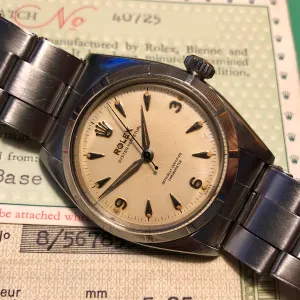 1954 Rolex Oyster Perpetual 6581 Caliber 1030 Steel Wristwatch with PX Store Box Papers and Chronometer Certificate
