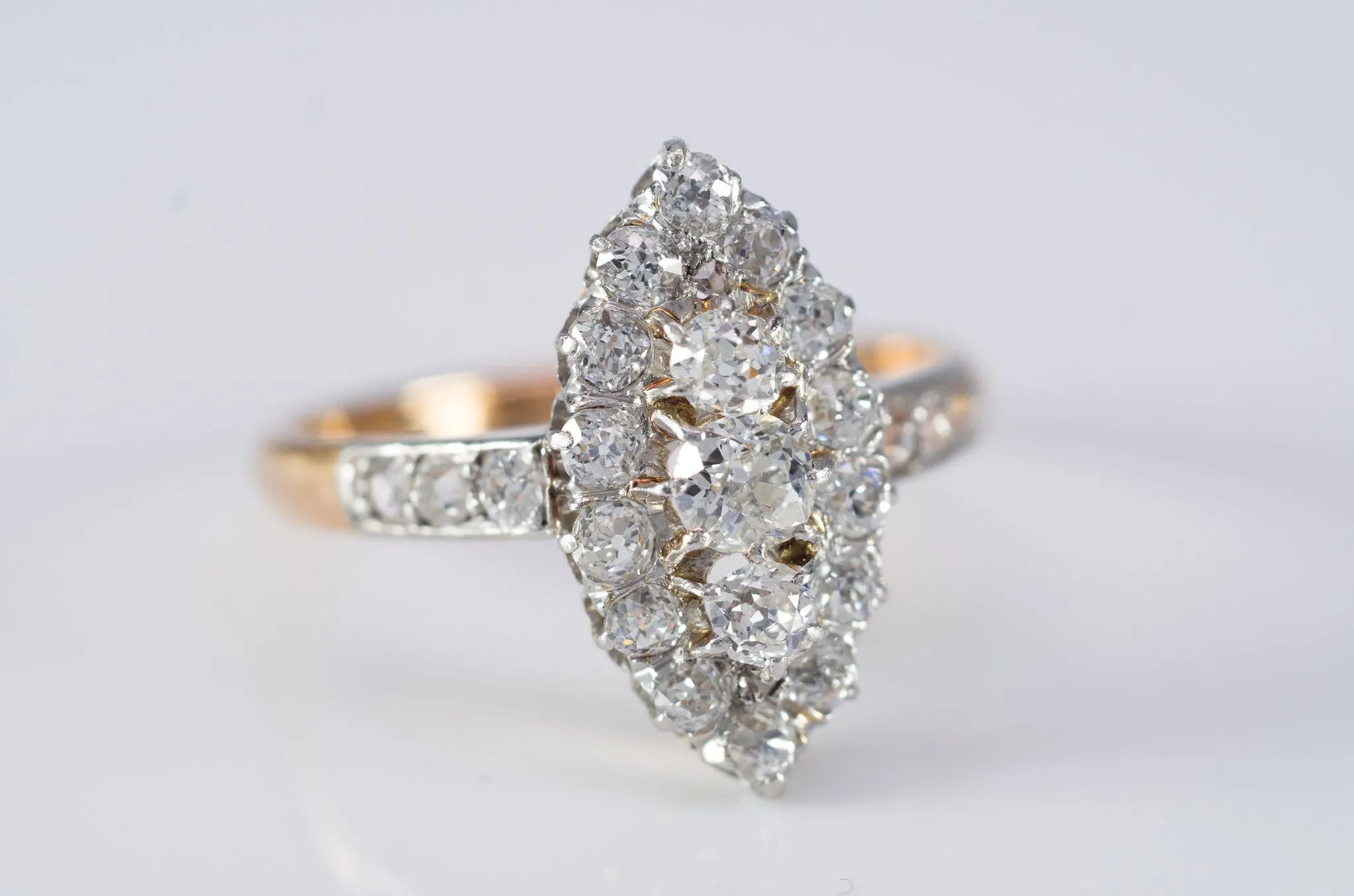 1CTW  ANTIQUE PLATINUM AND GOLD FRENCH NAVETTE DIAMOND RING