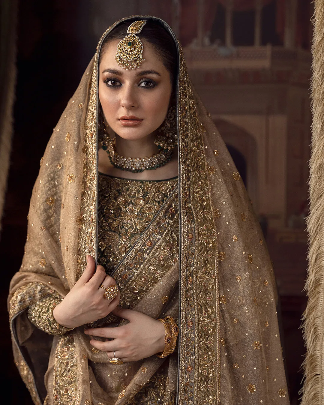Embellished Pakistani Bridal Dress in Lehenga Choli Dupatta Style in Premium Tissue Fabric