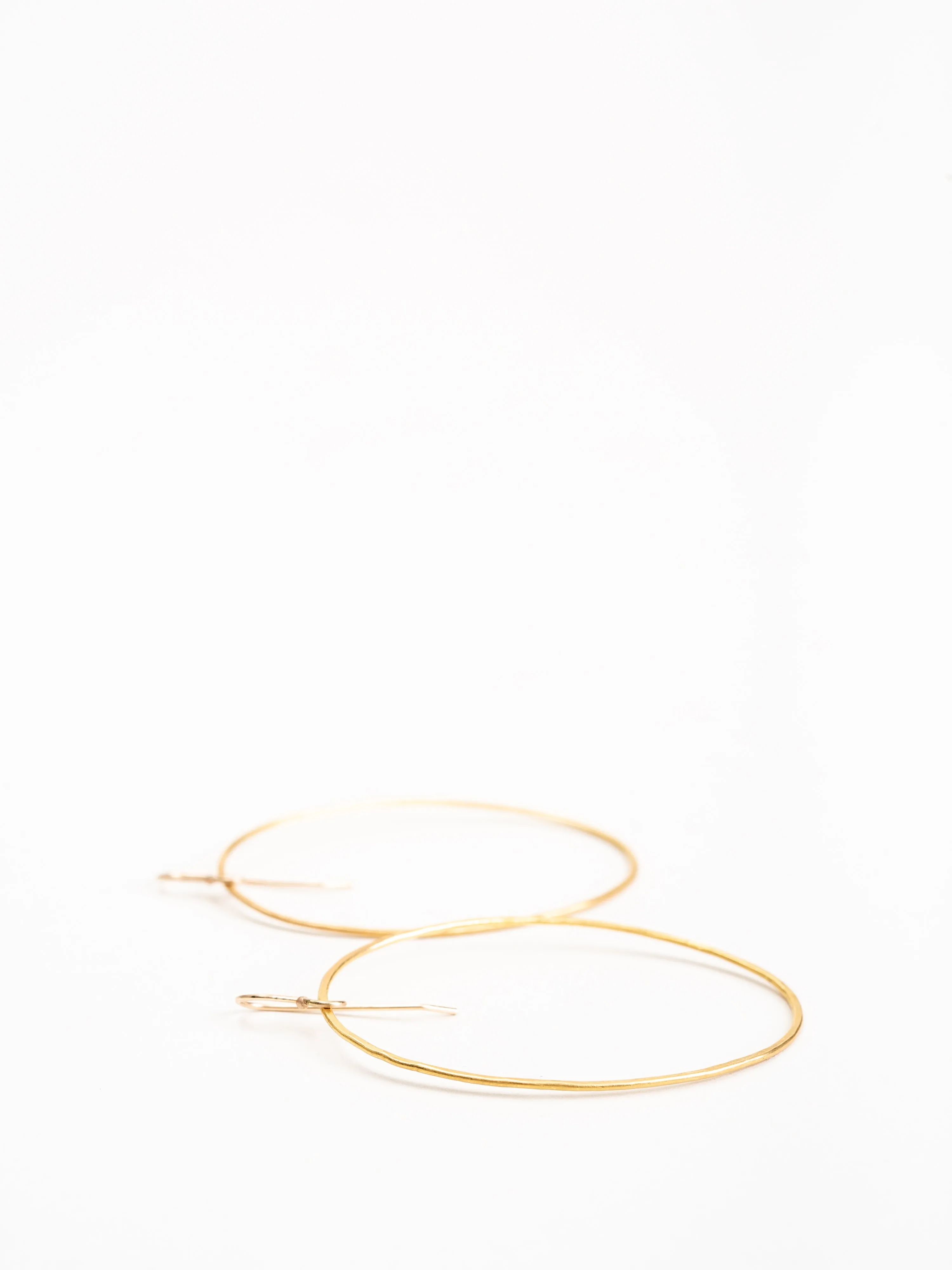 hammered gold large oval hoop
