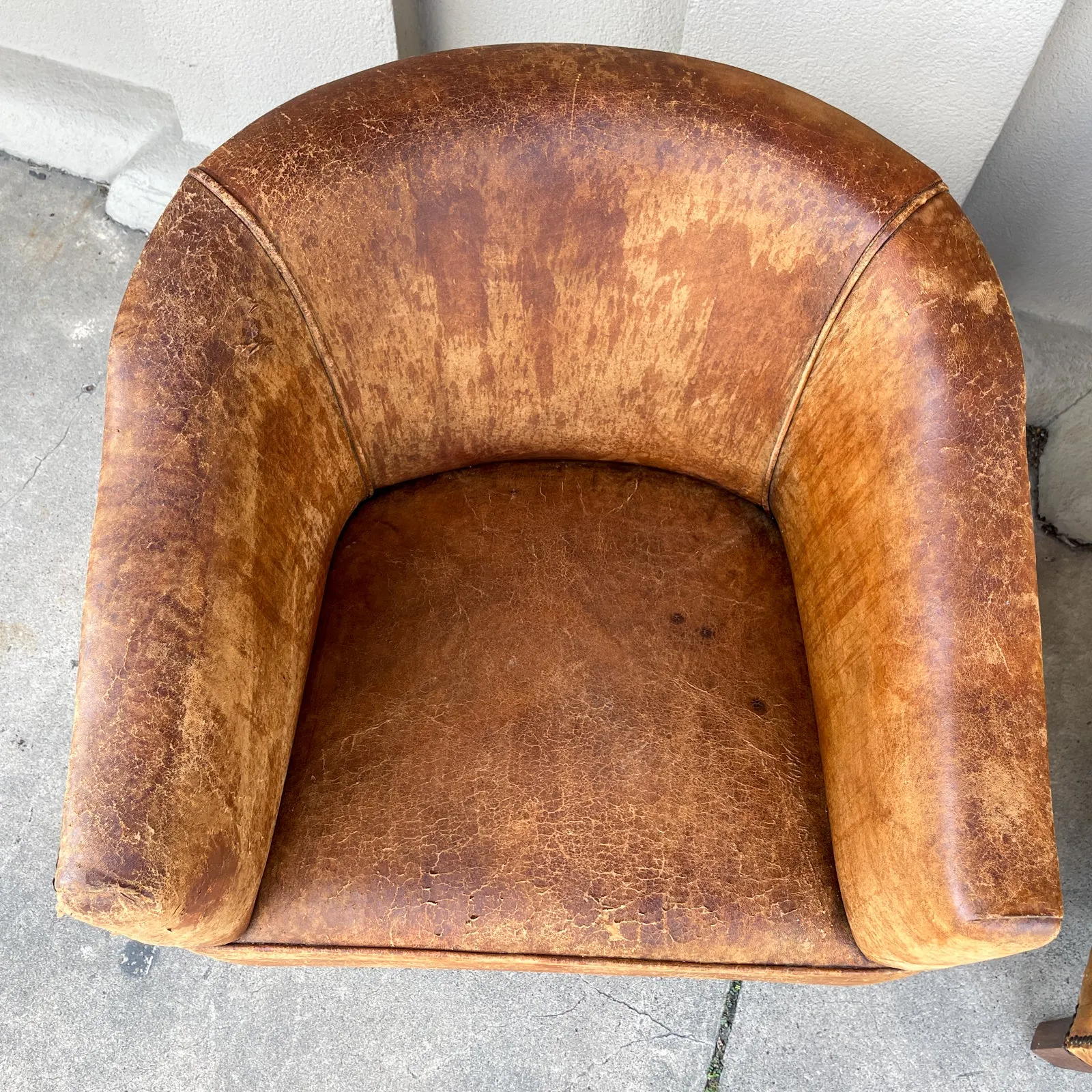 Pair Vintage European Leather Tub Chairs with Brass Nailhead Detail