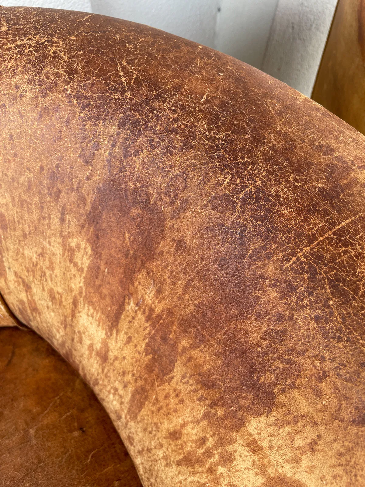 Pair Vintage European Leather Tub Chairs with Brass Nailhead Detail