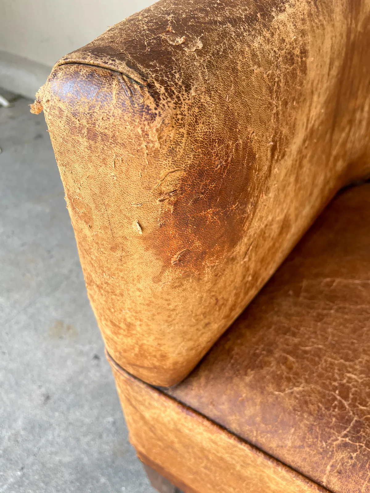 Pair Vintage European Leather Tub Chairs with Brass Nailhead Detail
