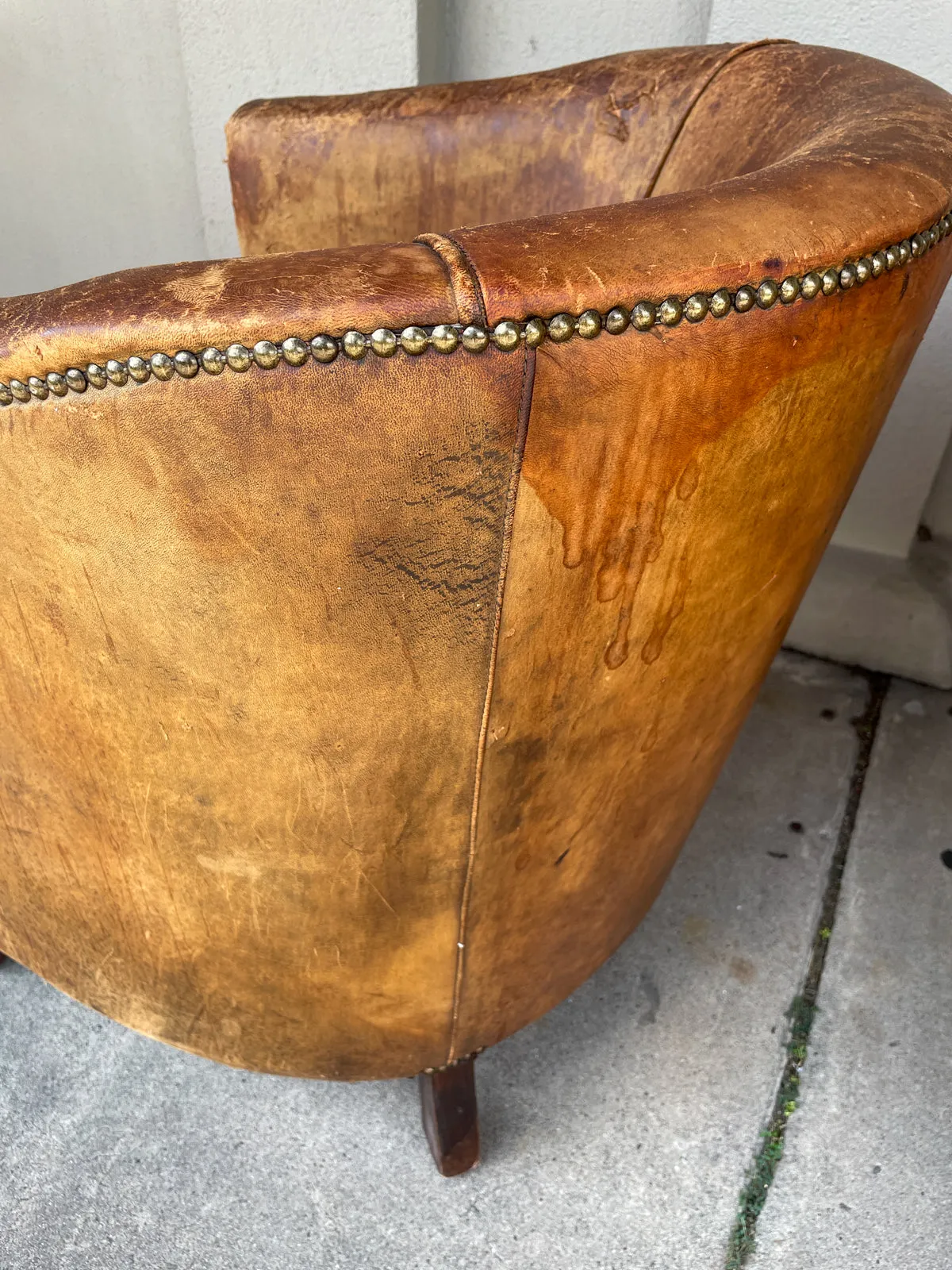 Pair Vintage European Leather Tub Chairs with Brass Nailhead Detail