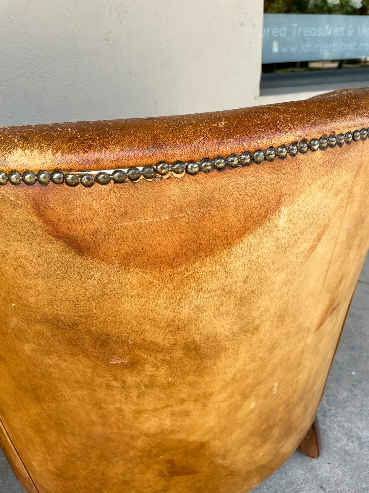 Pair Vintage European Leather Tub Chairs with Brass Nailhead Detail