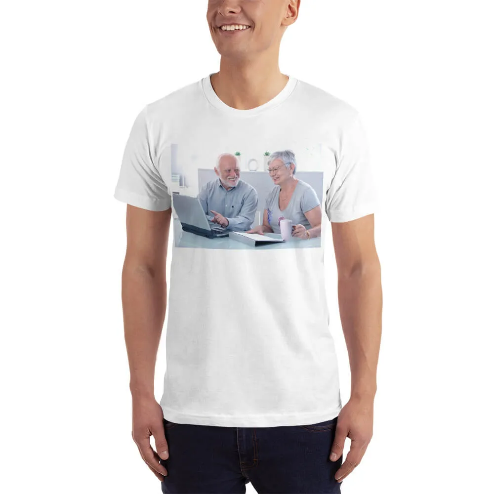Smiling seniors using a laptop