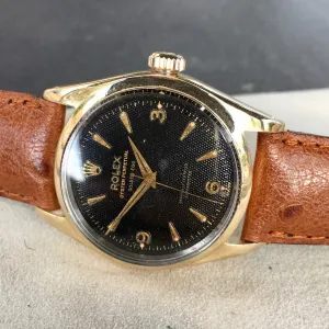 Vintage Rolex Oyster Perpetual 6634 "Golden Egg" Gold Capped Gilt Black Waffle Wristwatch