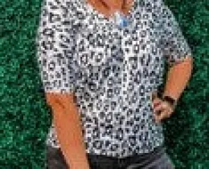 White Birch brand white and black polka dot top